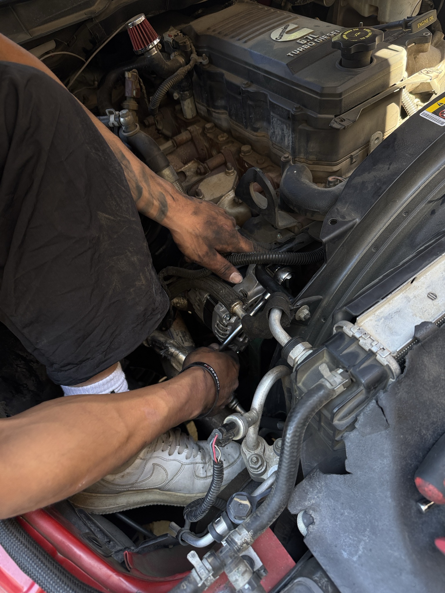 PA12 CF additive manufacturing — in-house part installed in engine bay